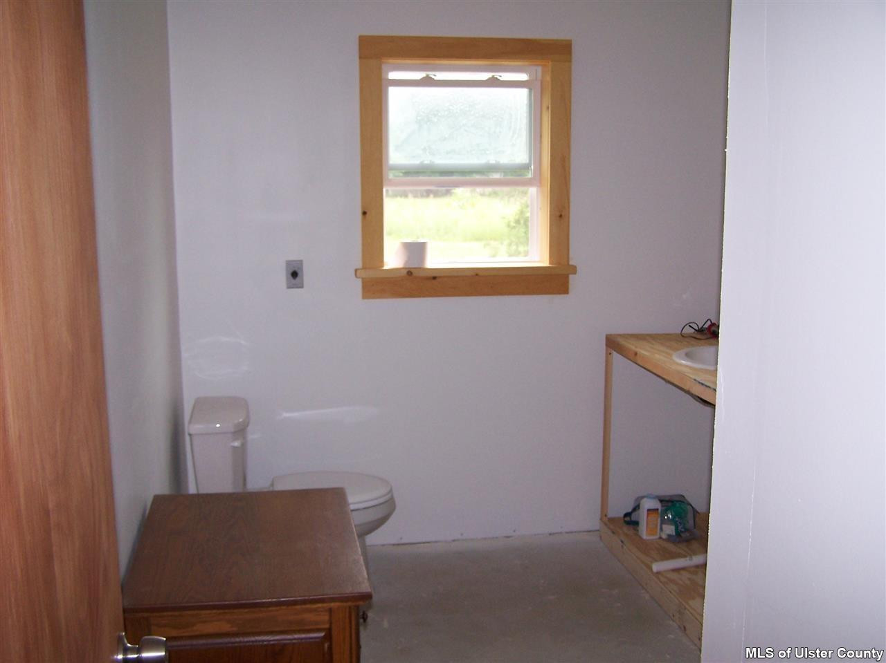 60 Piazza Road Kerhonkson, NY 12446 - Photo 8 of 14 a view of a room with windows