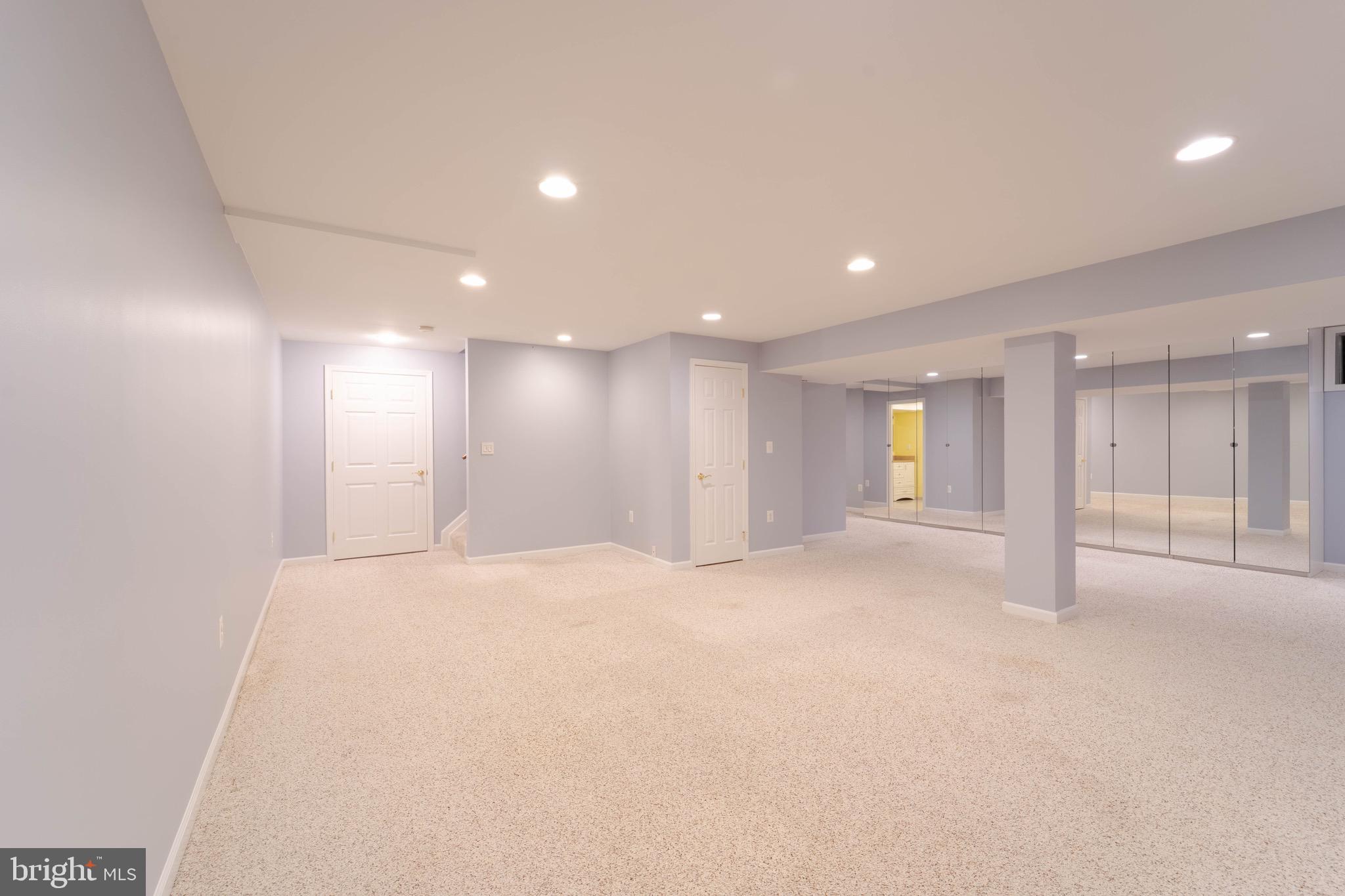 9407 Copernicus Drive Lanham, MD 20706 - Photo 36 of 48 a view of an empty room with a window