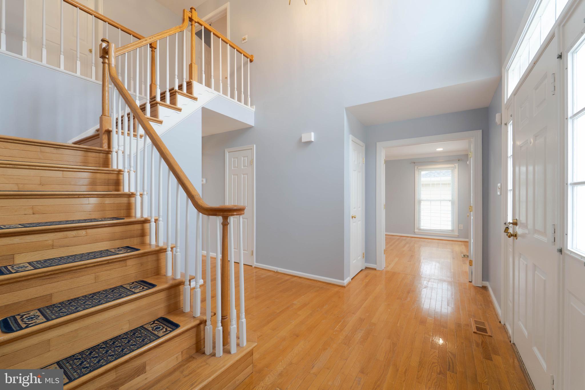 9407 Copernicus Drive Lanham, MD 20706 - Photo 4 of 48 a view of entryway and hall with wooden floor