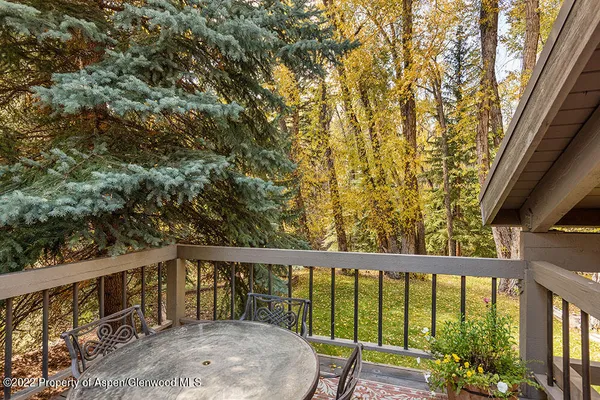 a view of a balcony with an outdoor space