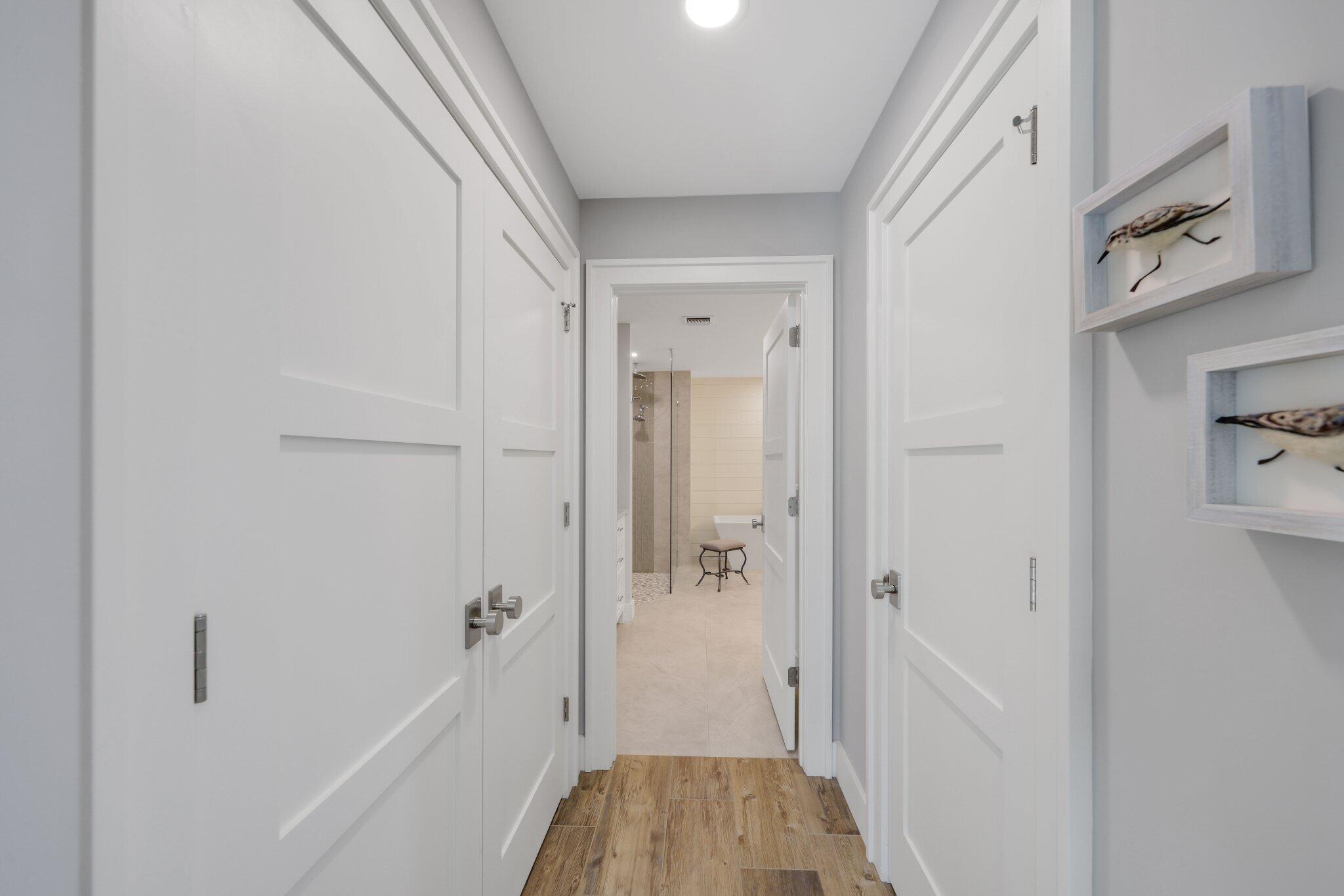215 Ridge Road Jupiter, FL 33477 - Photo 20 of 43 a bathroom with a bathtub and a shower