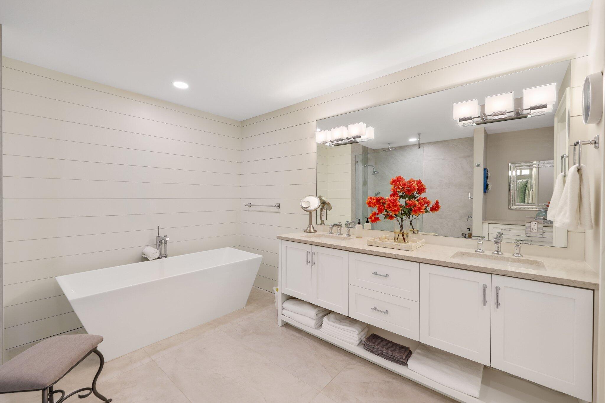 215 Ridge Road Jupiter, FL 33477 - Photo 22 of 43 a bathroom with a sink and a mirror