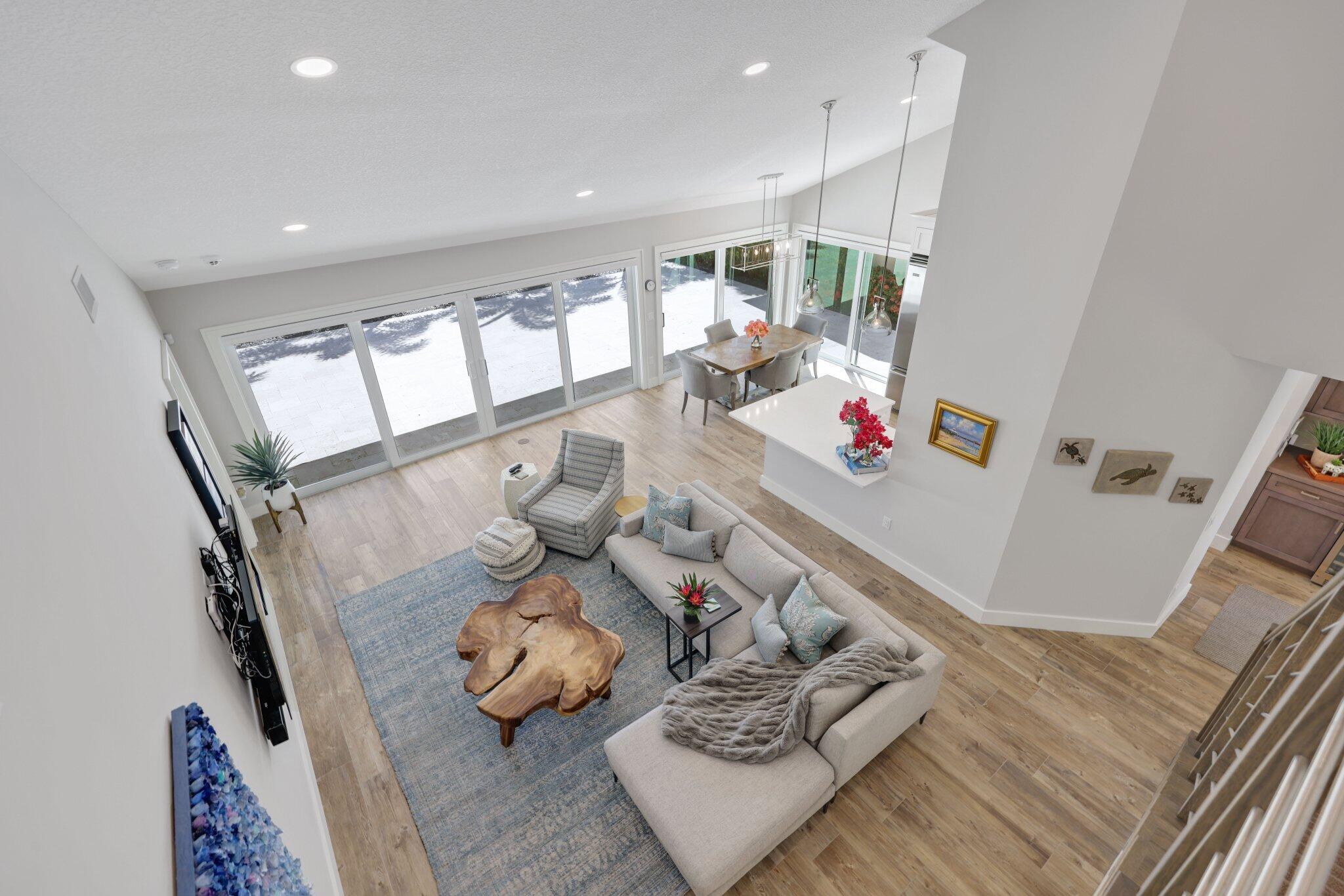 215 Ridge Road Jupiter, FL 33477 - Photo 31 of 43 a living room with furniture and wooden floor