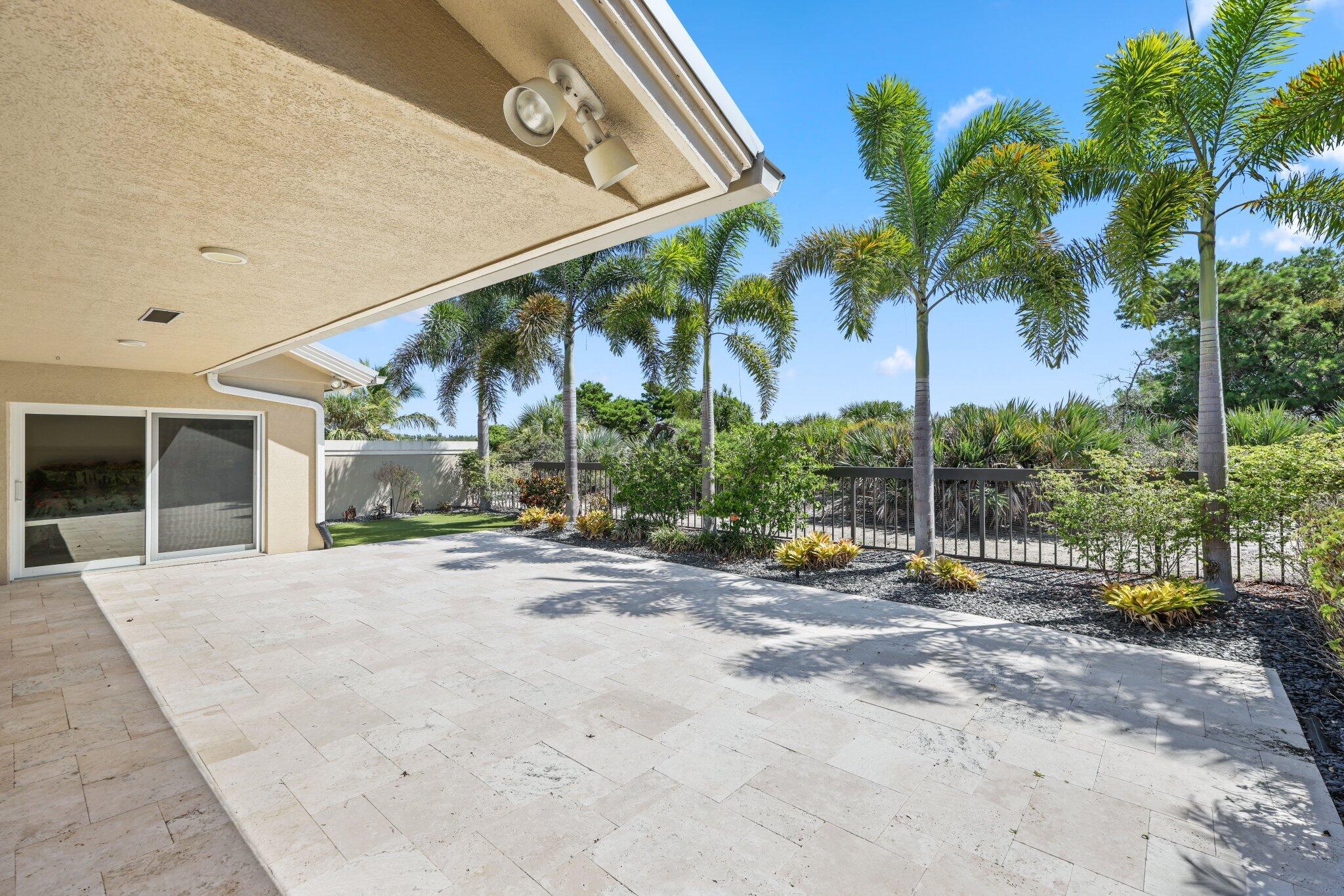 215 Ridge Road Jupiter, FL 33477 - Photo 35 of 43 a view of a house with backyard and sitting area