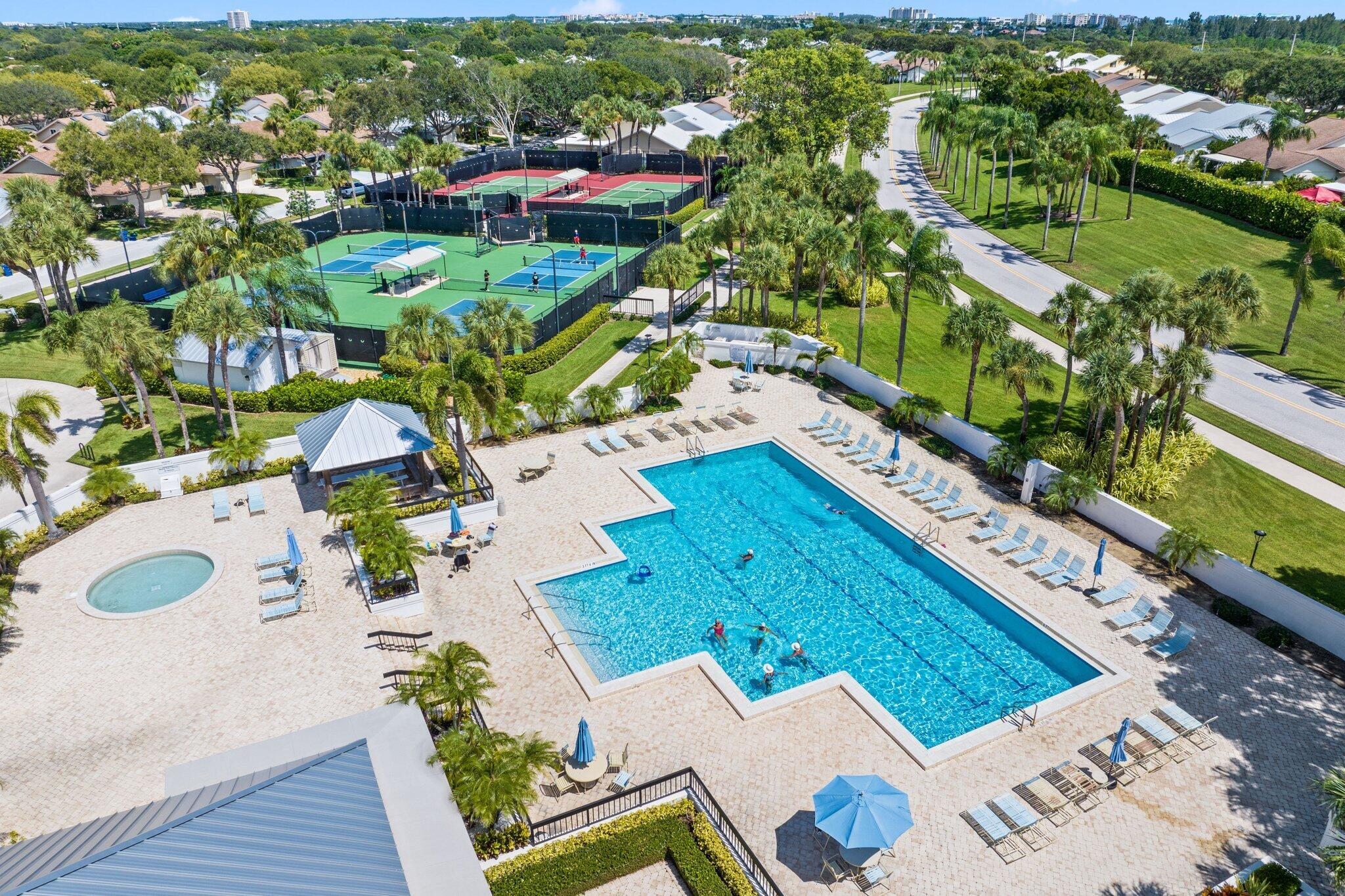 215 Ridge Road Jupiter, FL 33477 - Photo 42 of 43 an aerial view of residential house with outdoor space and swimming pool