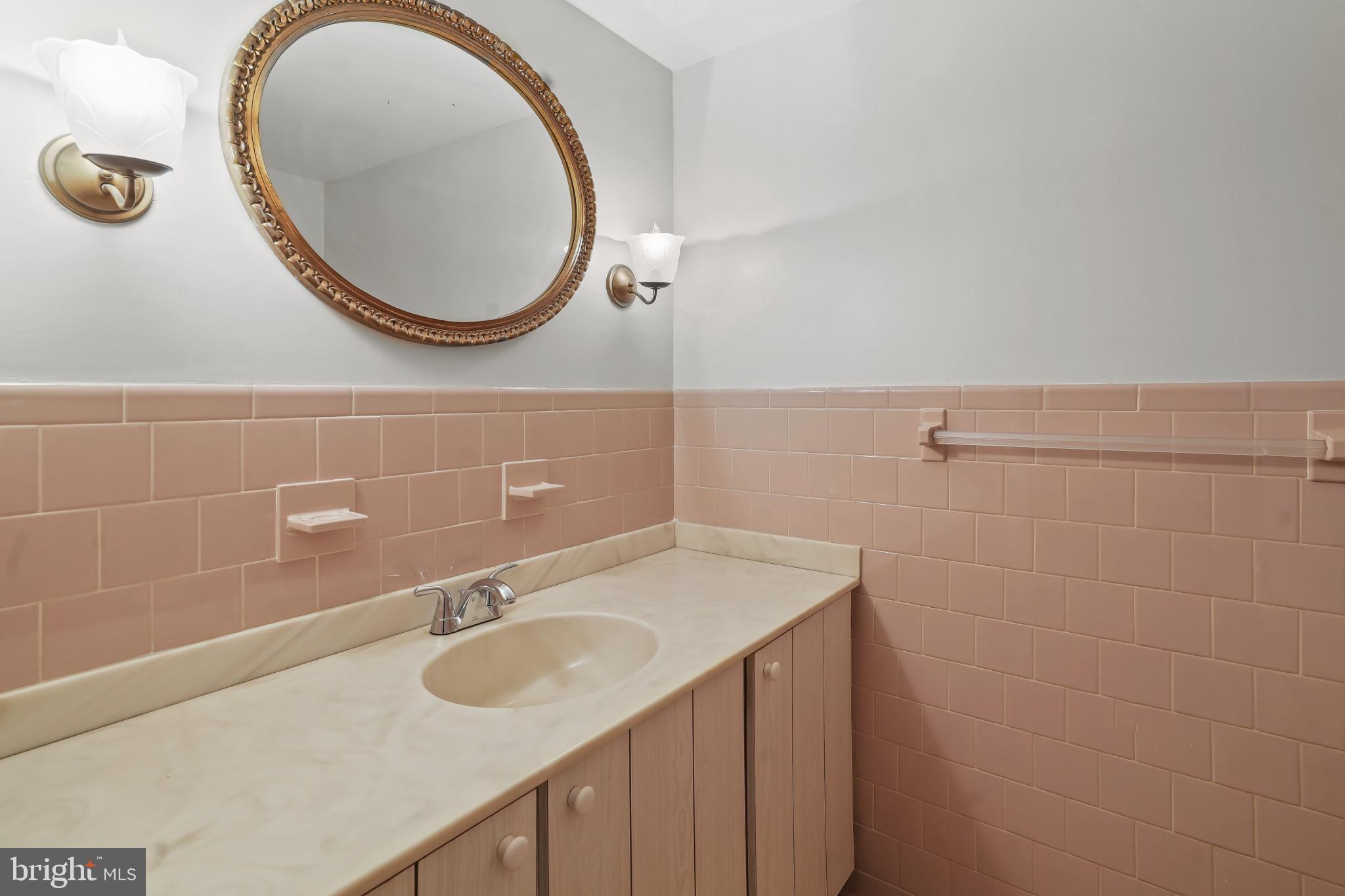11122 Old Carriage Road Glen Arm, MD 21057 - Photo 21 of 56 Powder Room Serves Living and Family Room Levels