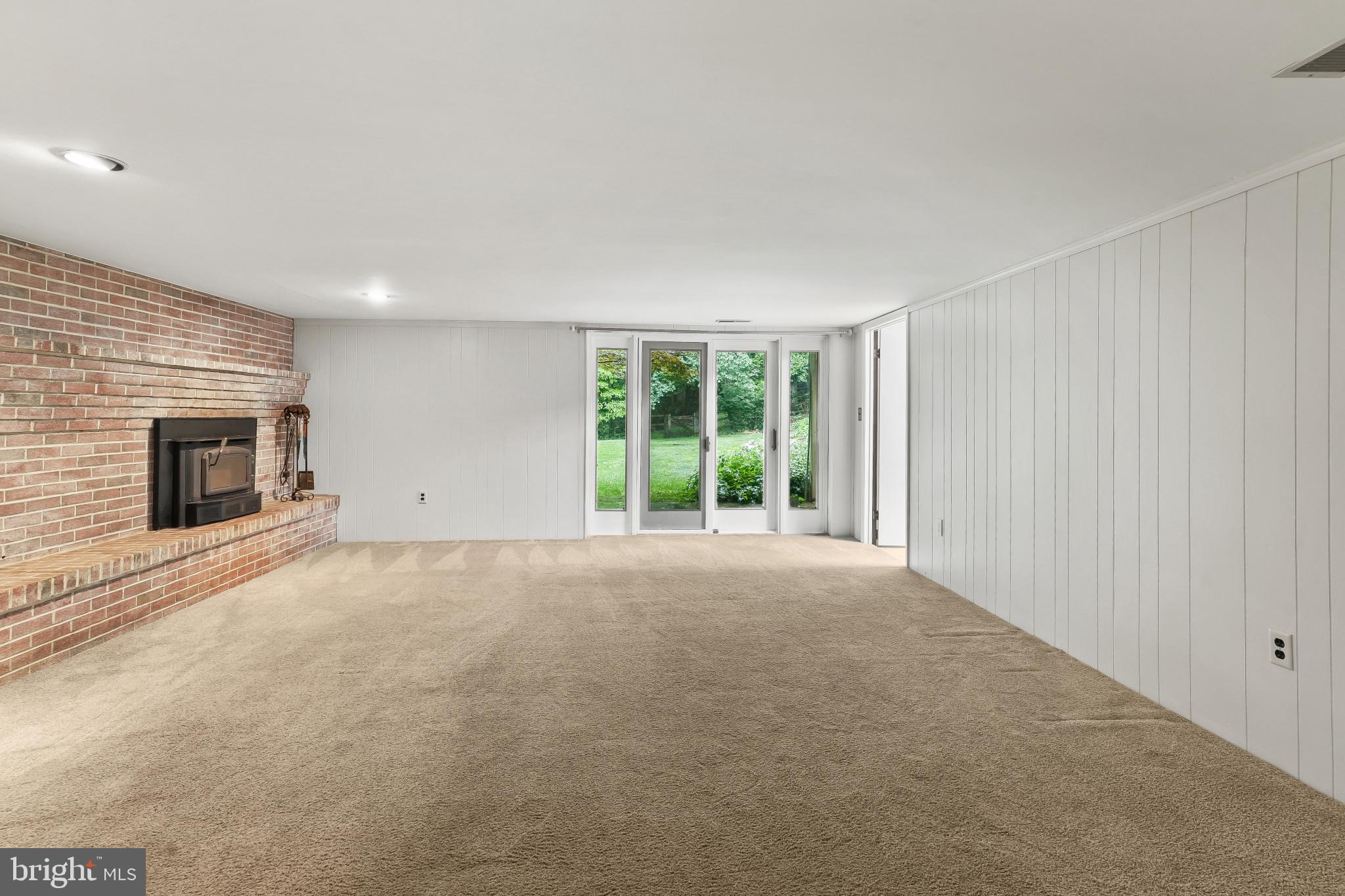 11122 Old Carriage Road Glen Arm, MD 21057 - Photo 26 of 56 Family Room w/ Access to the Backyard