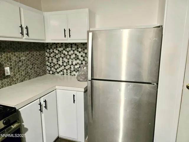 an empty room with a hardwood