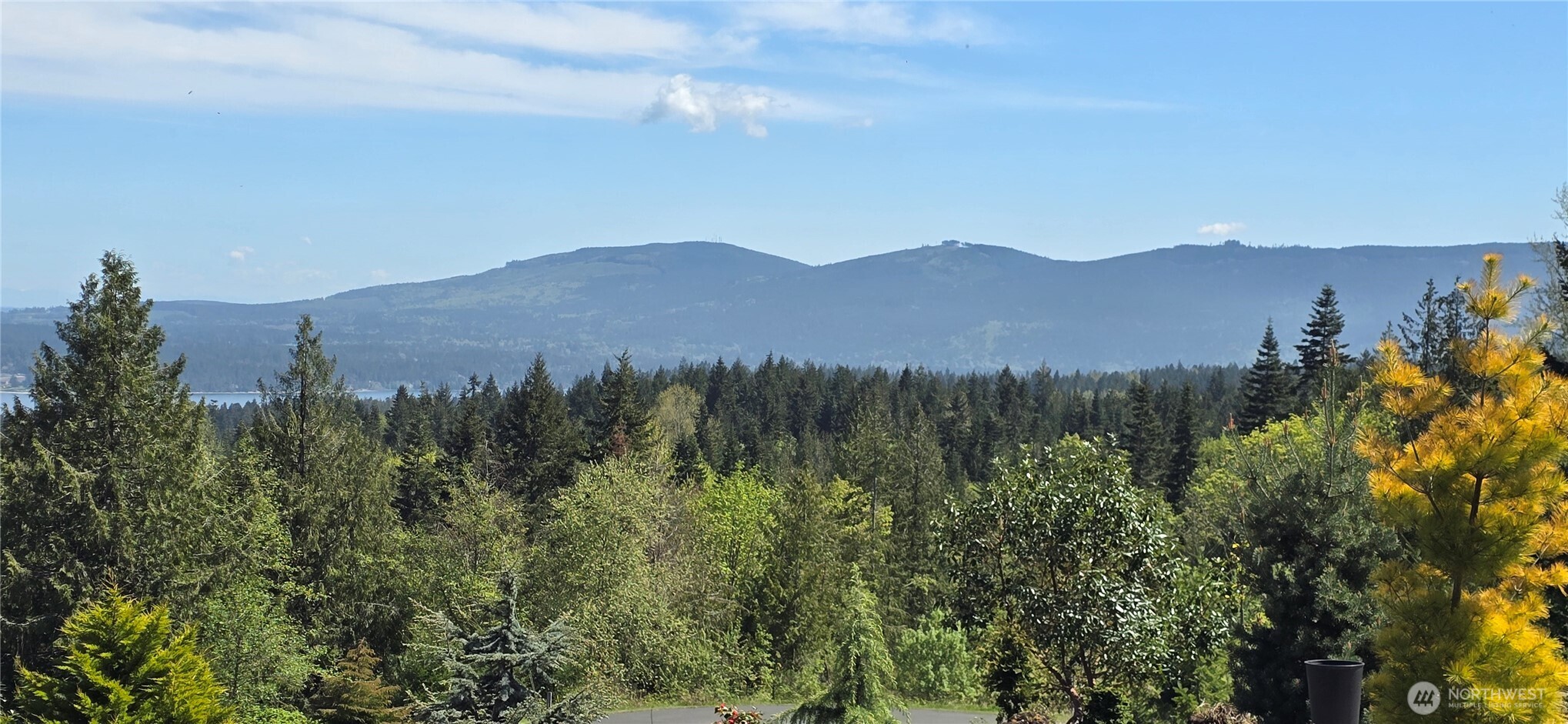 15 High Vw Way Sequim, WA 98382 - Photo 16 of 17 a view of a top of a house with a mountain in the background