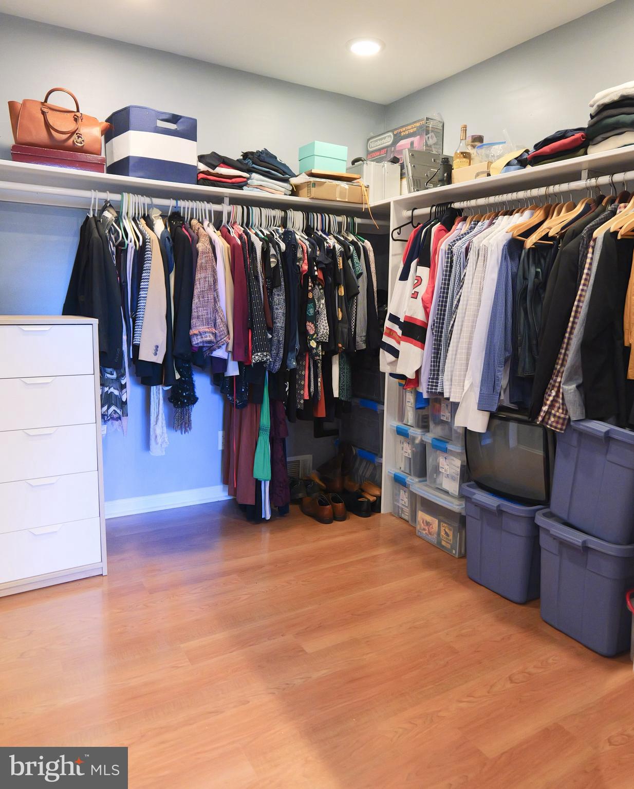 7323 Inzer Street Springfield, VA 22151 - Photo 17 of 25 a view of walk in closet with clothes and shoes