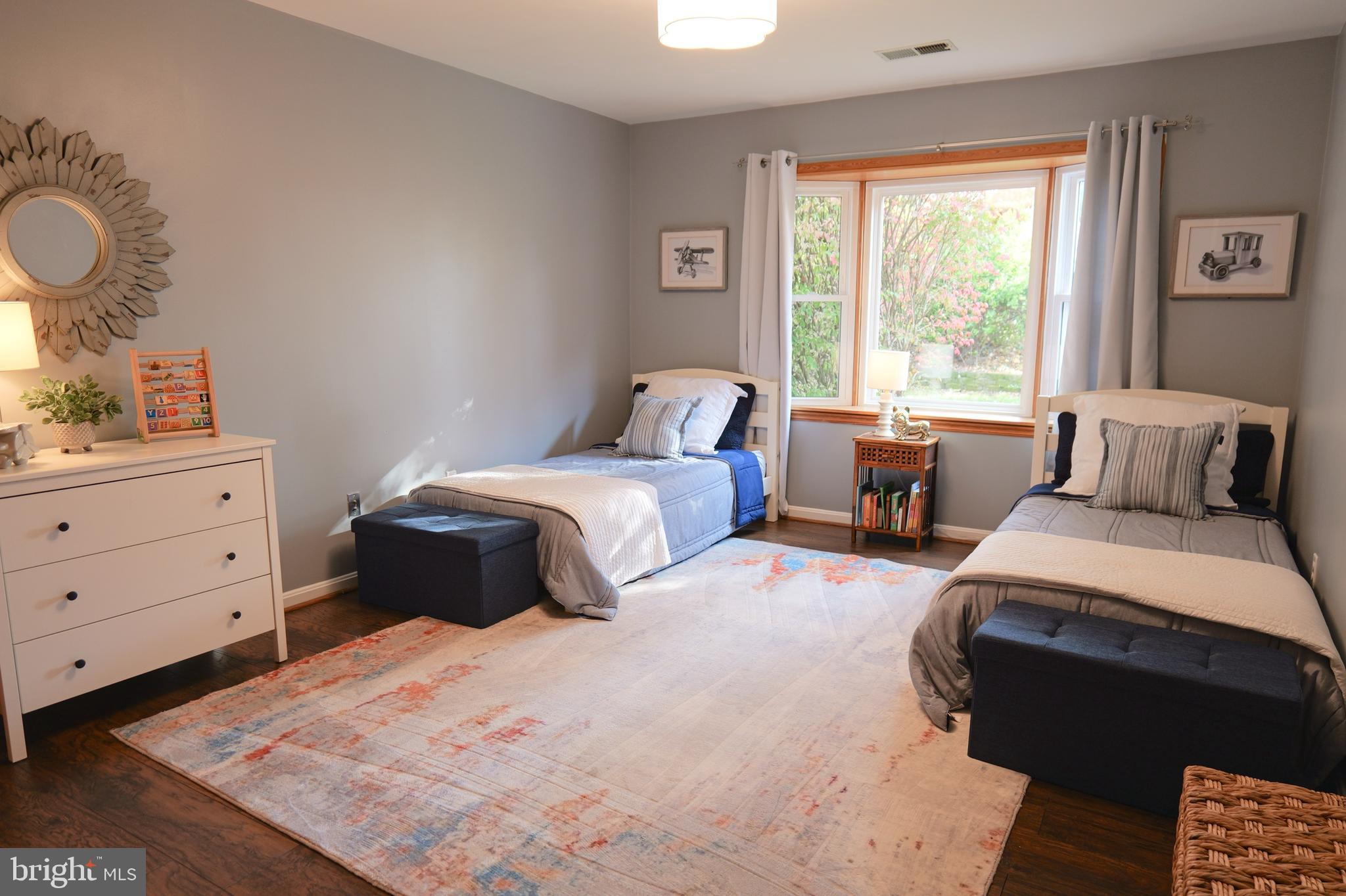7323 Inzer Street Springfield, VA 22151 - Photo 20 of 25 a bedroom with a bed and window