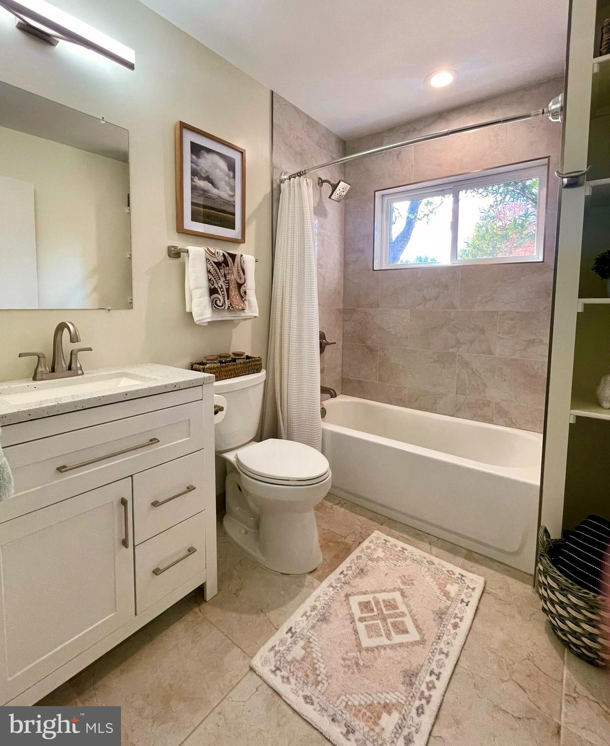 7323 Inzer Street Springfield, VA 22151 - Photo 22 of 25 a bathroom with a sink toilet and shower
