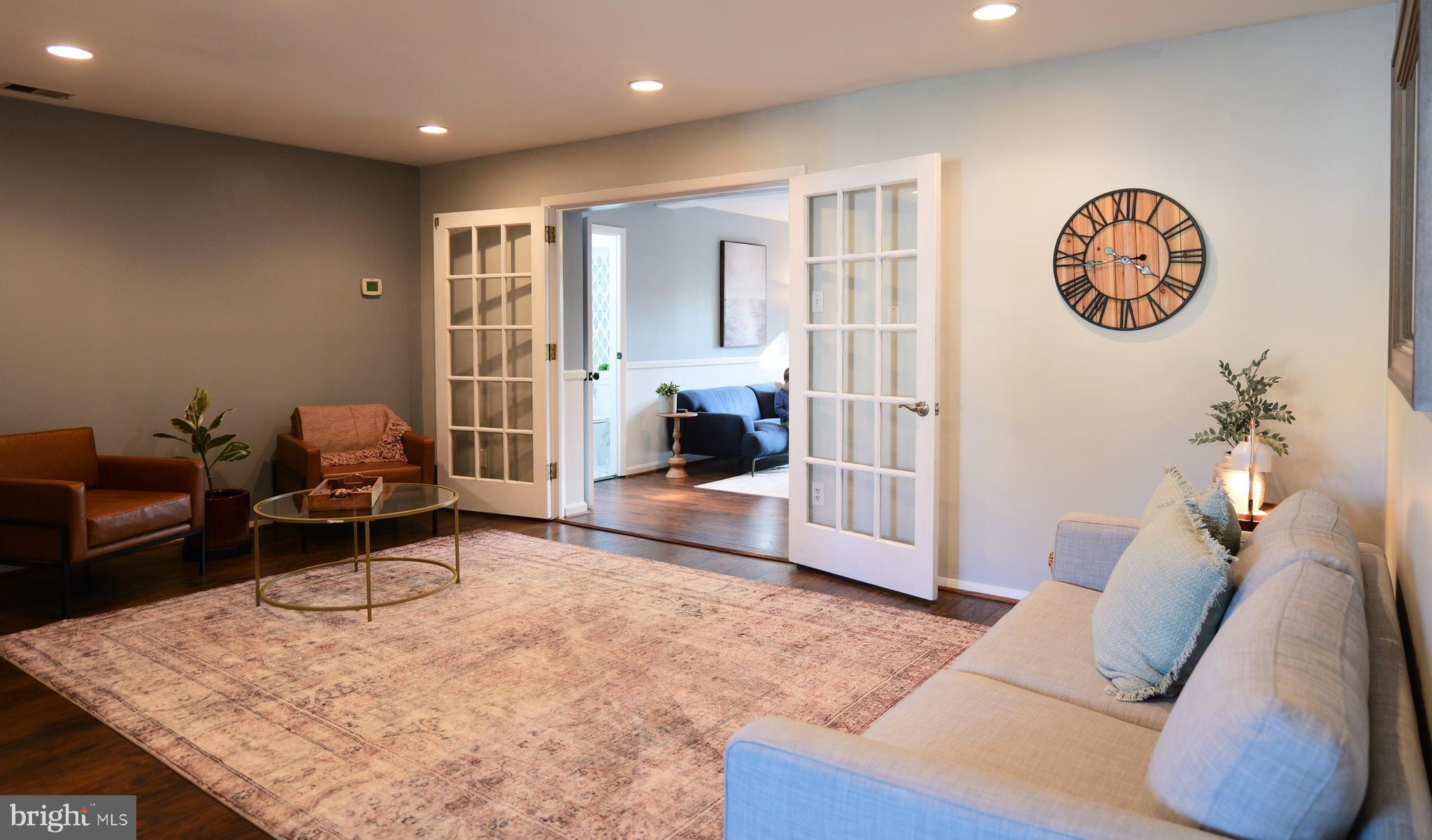 7323 Inzer Street Springfield, VA 22151 - Photo 8 of 25 a living room with furniture and a large window