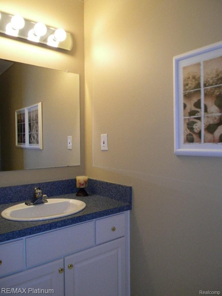 5123 North Fleming Road Fowlerville, MI 48836 - Photo 9 of 25 Convenient 1/2 Bath