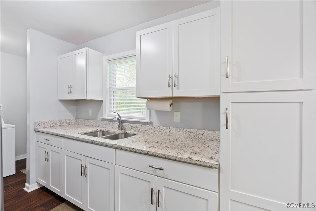 4660 Marks Lane Goochland, VA 23063 - Photo 15 of 39 a kitchen with granite countertop white cabinets and a sink