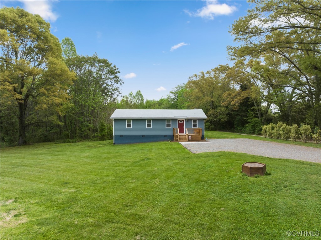 4660 Marks Lane Goochland, VA 23063 - Photo 2 of 39 a view of a house with pool and garden