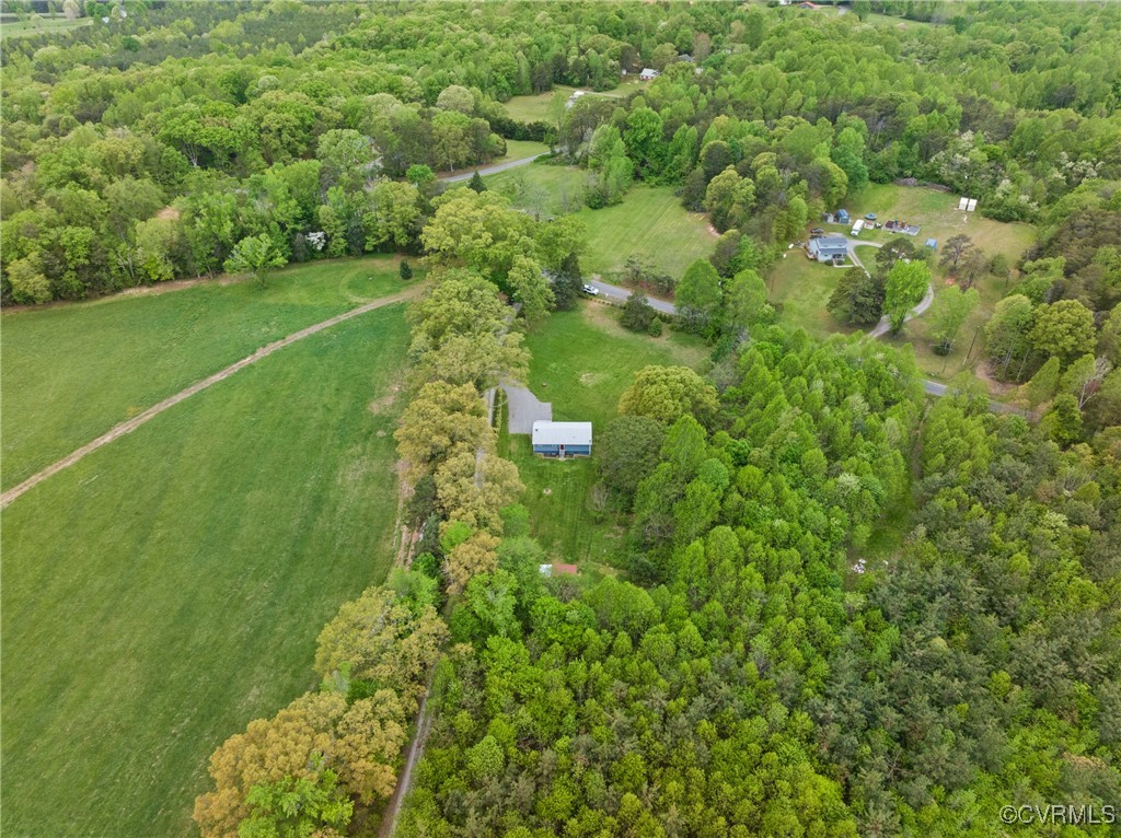 4660 Marks Lane Goochland, VA 23063 - Photo 31 of 39 a view of a big yard with plants and large trees