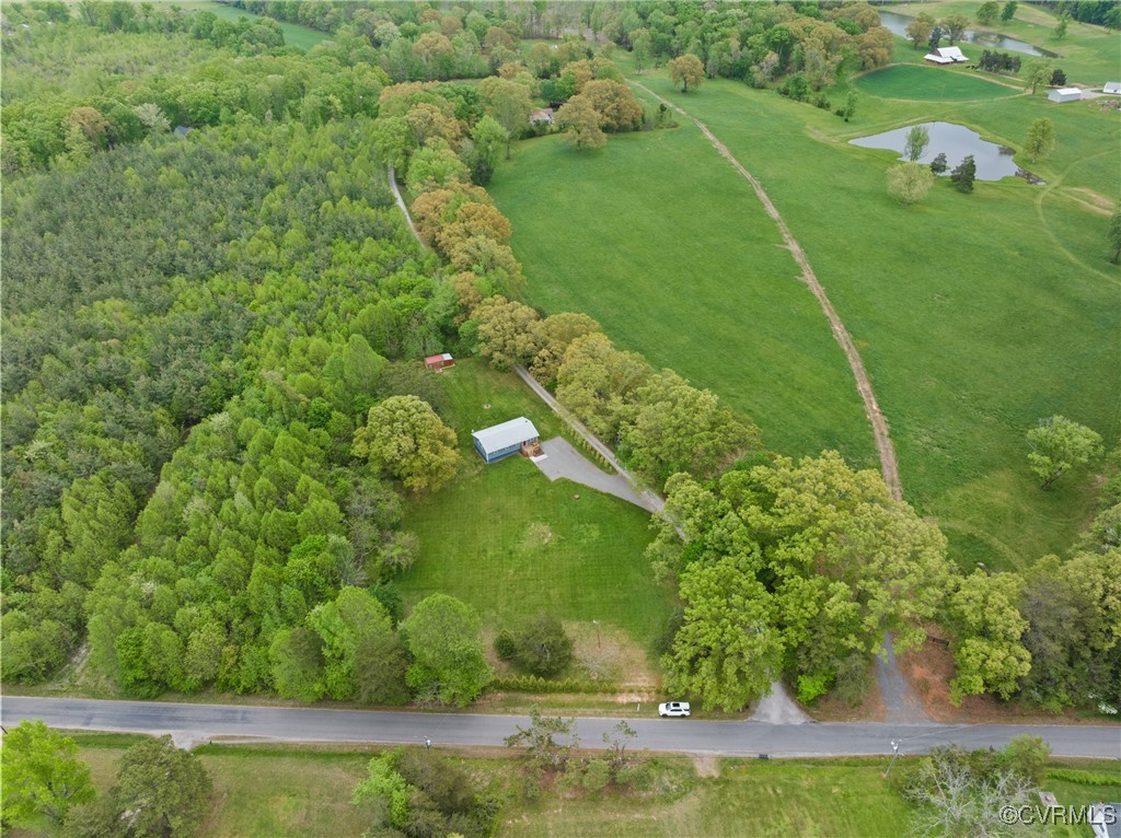 4660 Marks Lane Goochland, VA 23063 - Photo 36 of 39 a view of a garden with a lake