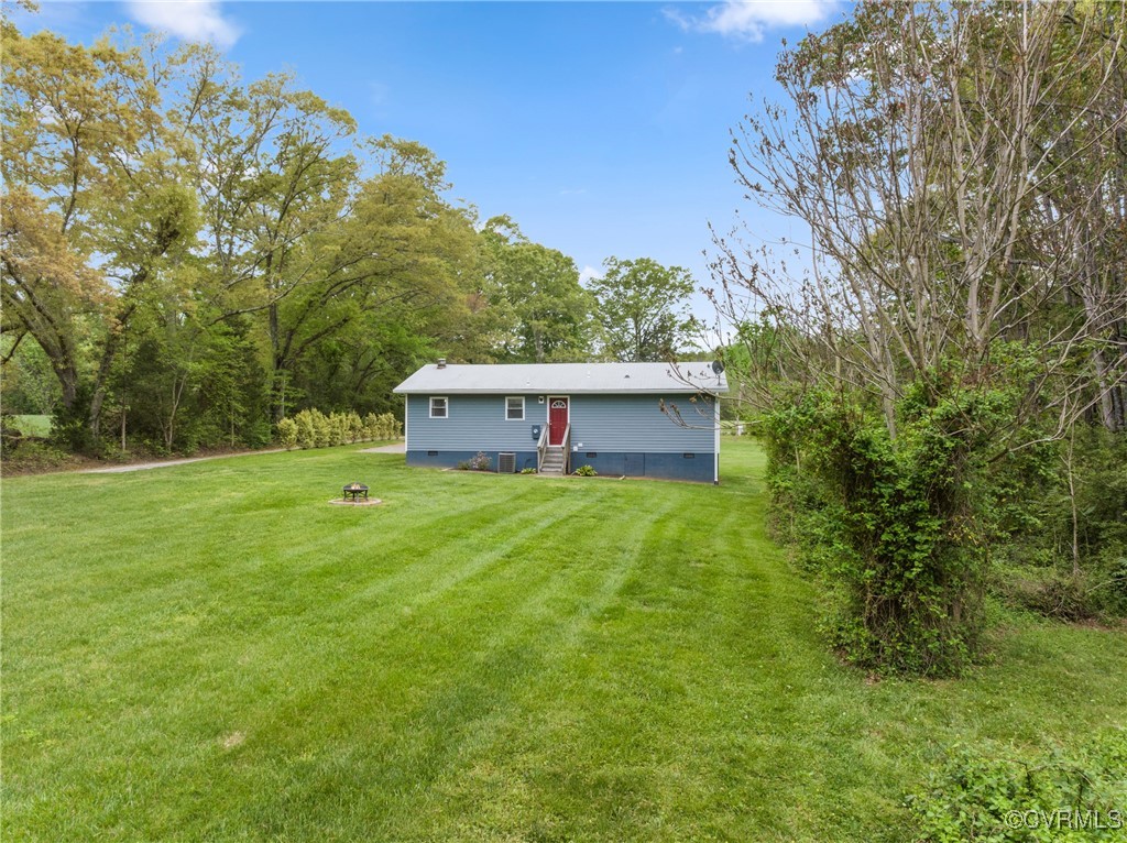 4660 Marks Lane Goochland, VA 23063 - Photo 4 of 39 a view of a house with a backyard