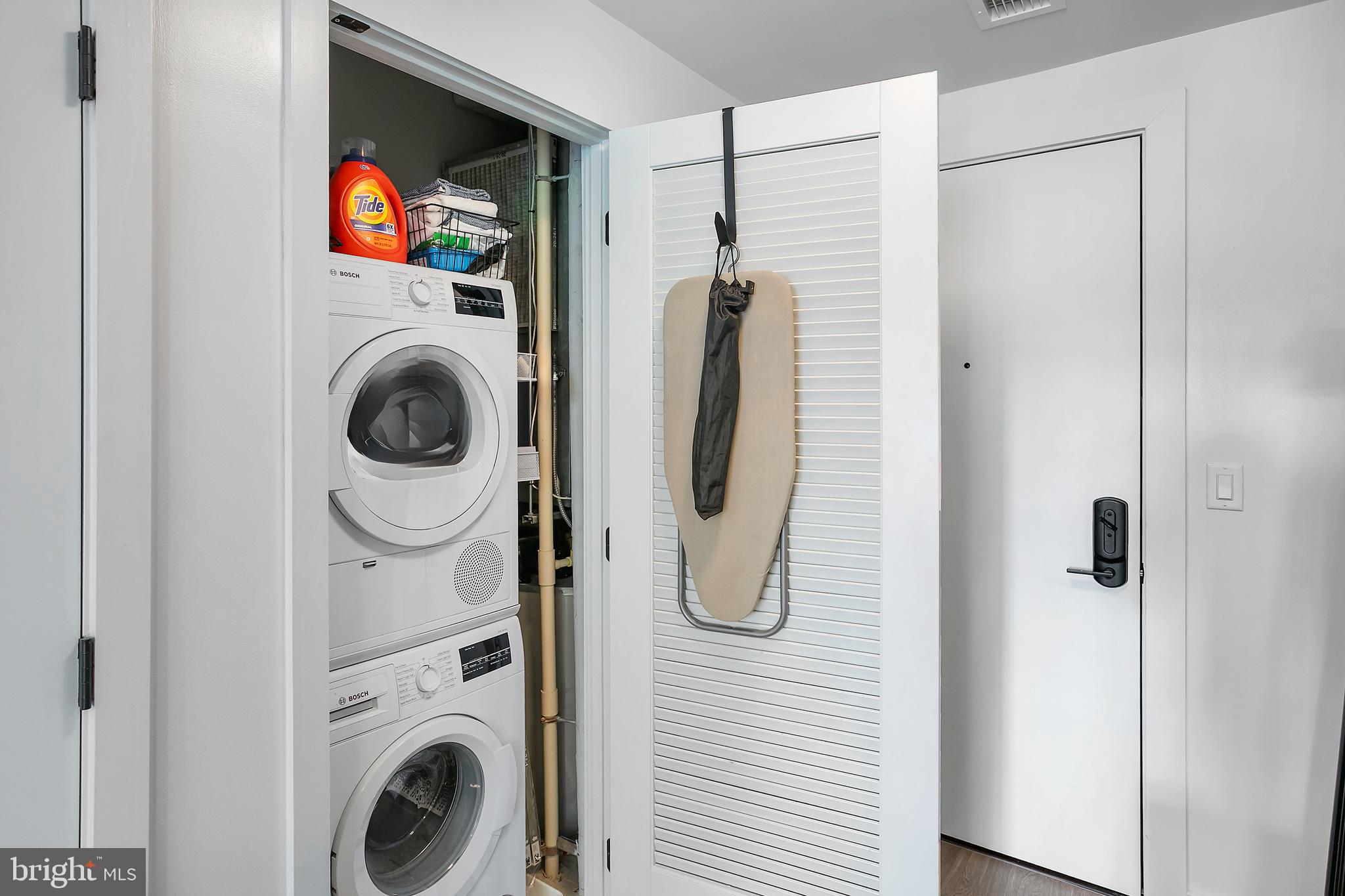 1625 Eckington Place Northeast, Unit 421 Washington, DC 20002 - Photo 21 of 40 a utility room with dryer and washer