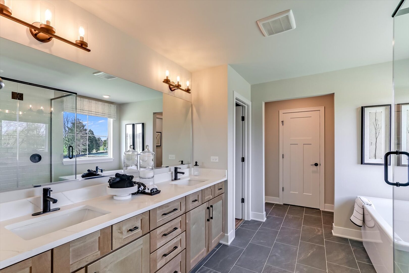 10854 Saxony Street Huntley, IL 60142 - Photo 24 of 30 a bathroom with double sink and a mirror