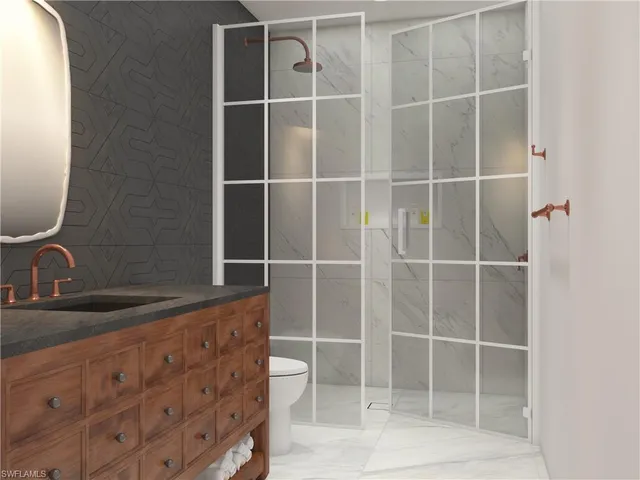 a bathroom with a sink a mirror and a shower