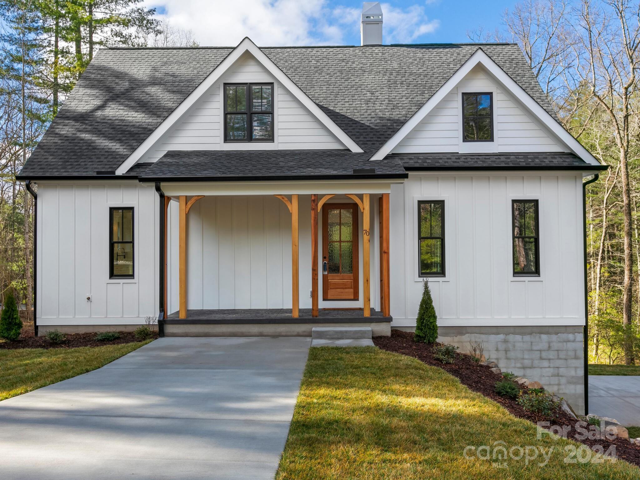 70 Reta Road Fairview, NC 28730 - Photo 1 of 22 a view of house with yard