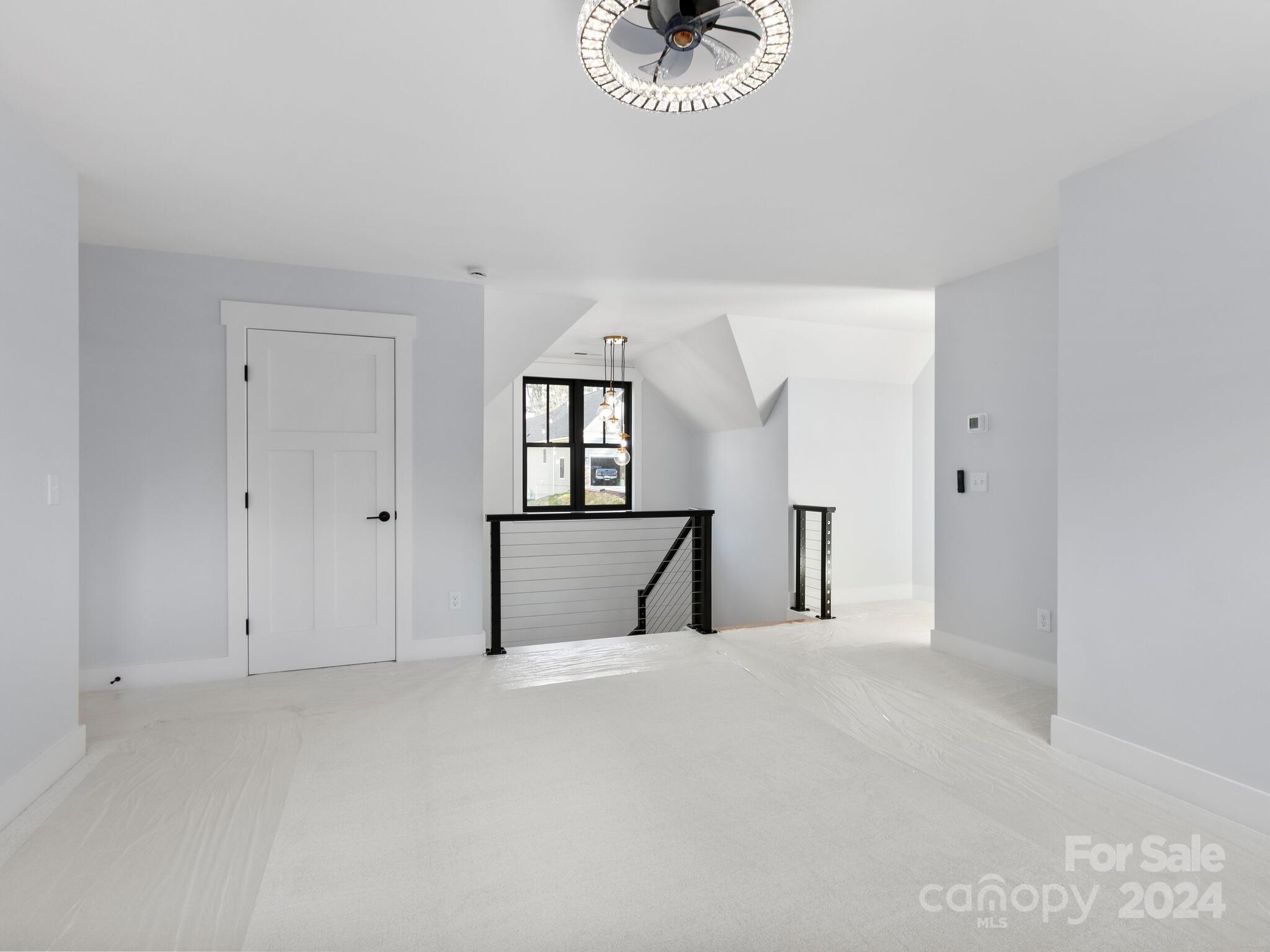70 Reta Road Fairview, NC 28730 - Photo 15 of 22 a view of an empty room with a window