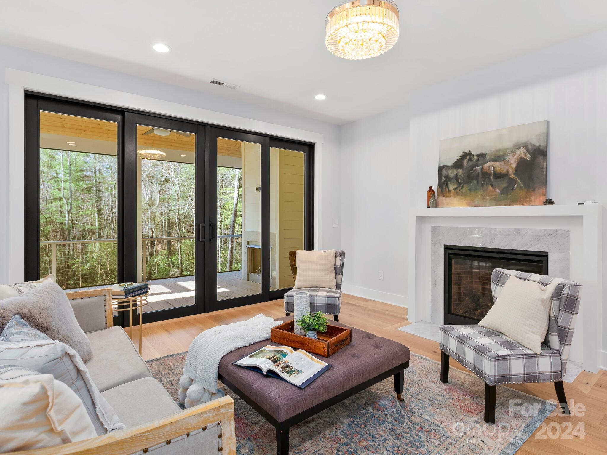 70 Reta Road Fairview, NC 28730 - Photo 4 of 22 a living room with furniture and a large window