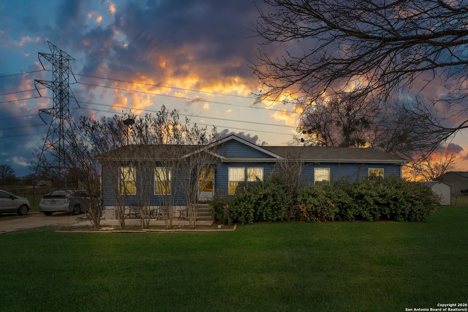2760 Pioneer Road Seguin, TX 78155 - Photo 1 of 31 a front view of a house with a garden