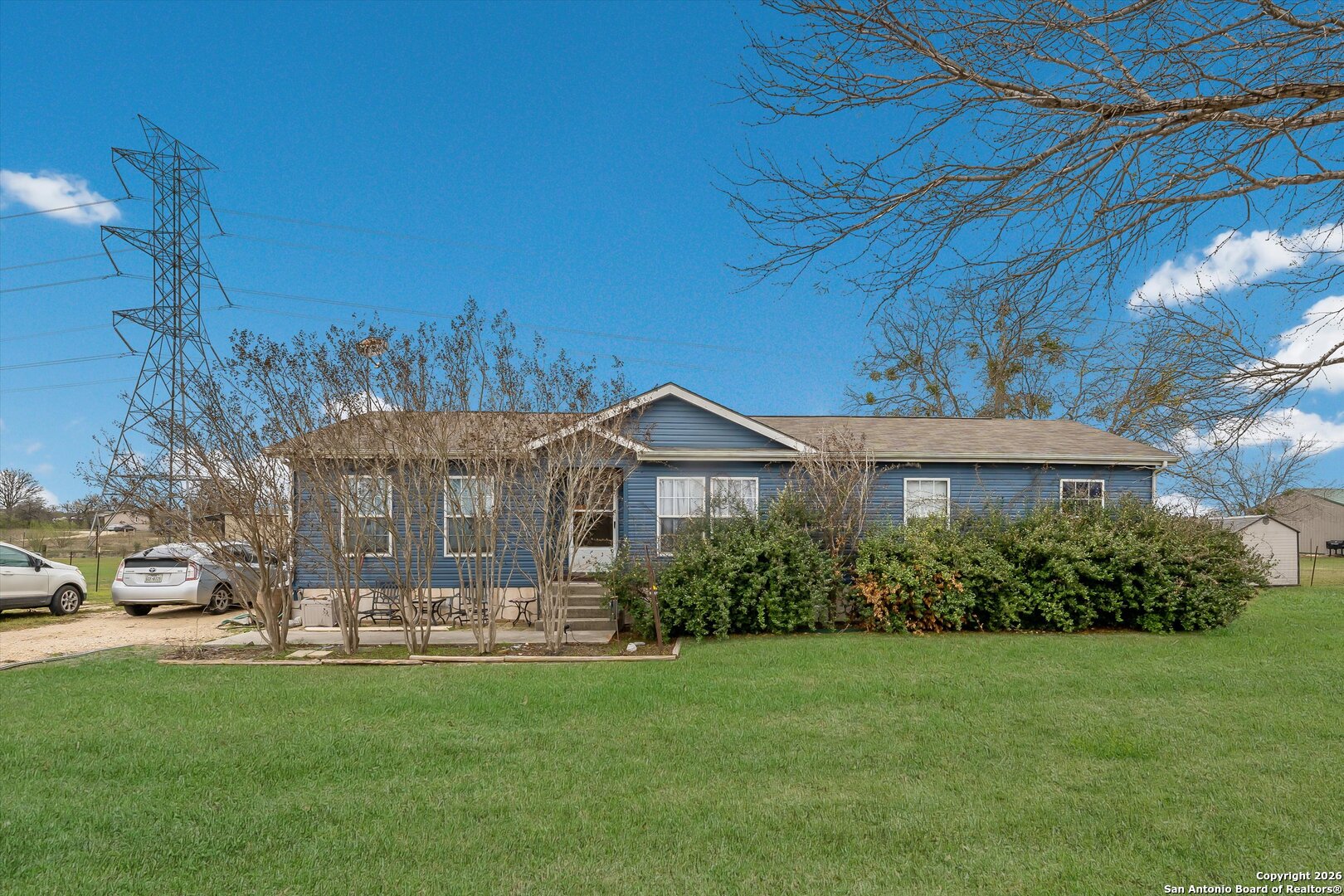 2760 Pioneer Road Seguin, TX 78155 - Photo 2 of 31 a front view of a house with garden