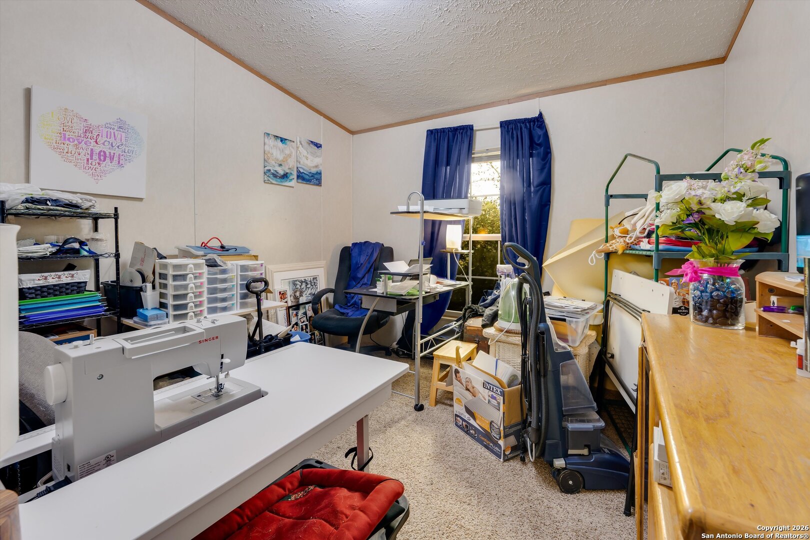 2760 Pioneer Road Seguin, TX 78155 - Photo 25 of 31 a view of a workspace with furniture and toys