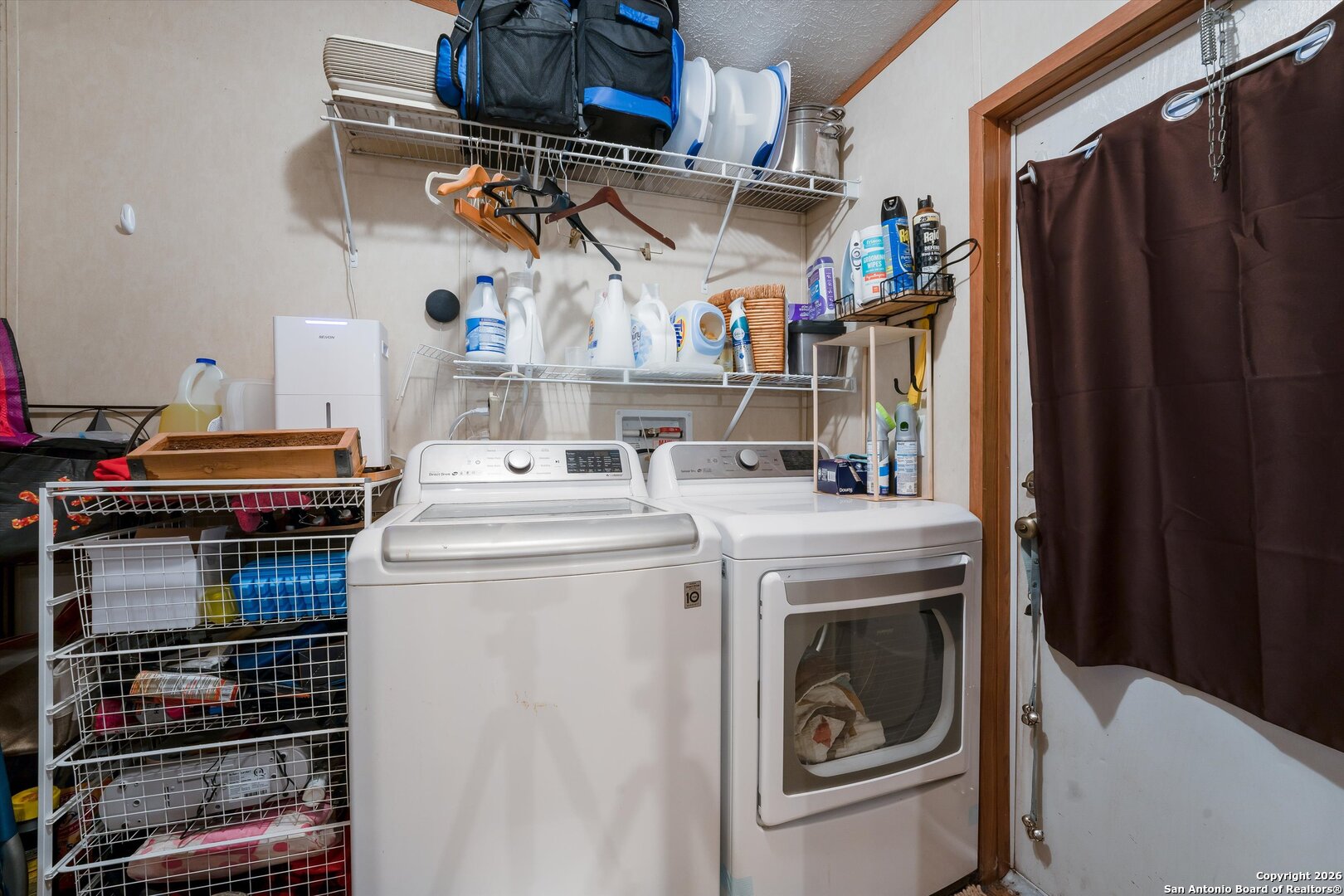 2760 Pioneer Road Seguin, TX 78155 - Photo 27 of 31 a utility room with dryer and washer