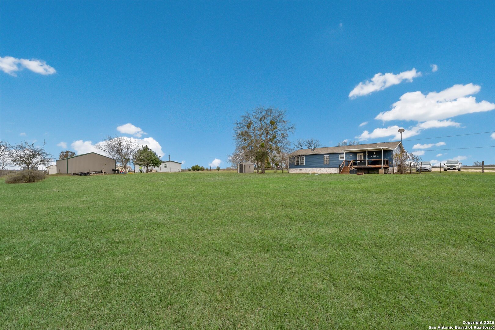 2760 Pioneer Road Seguin, TX 78155 - Photo 29 of 31 a view of a house with a big yard