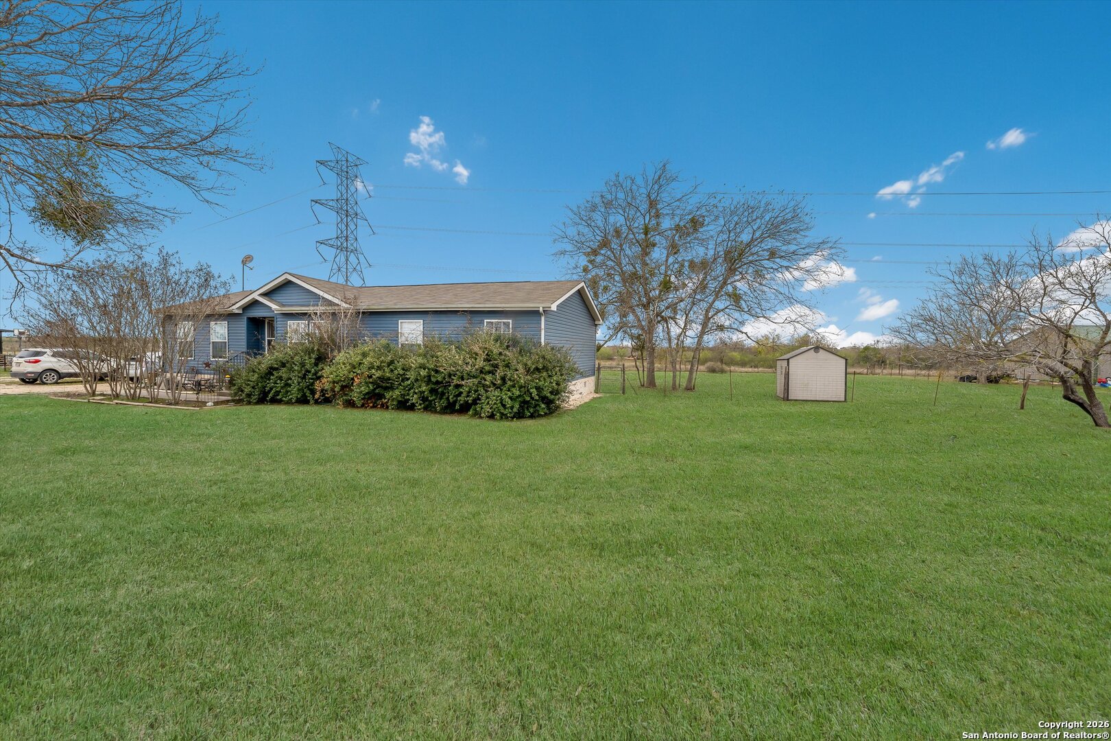 2760 Pioneer Road Seguin, TX 78155 - Photo 4 of 31 a front view of a house with garden