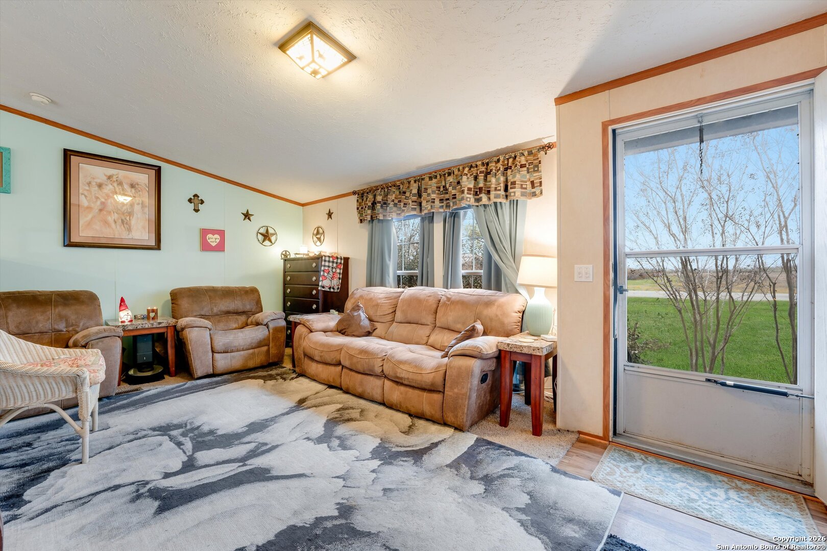 2760 Pioneer Road Seguin, TX 78155 - Photo 7 of 31 a living room with furniture and a large window