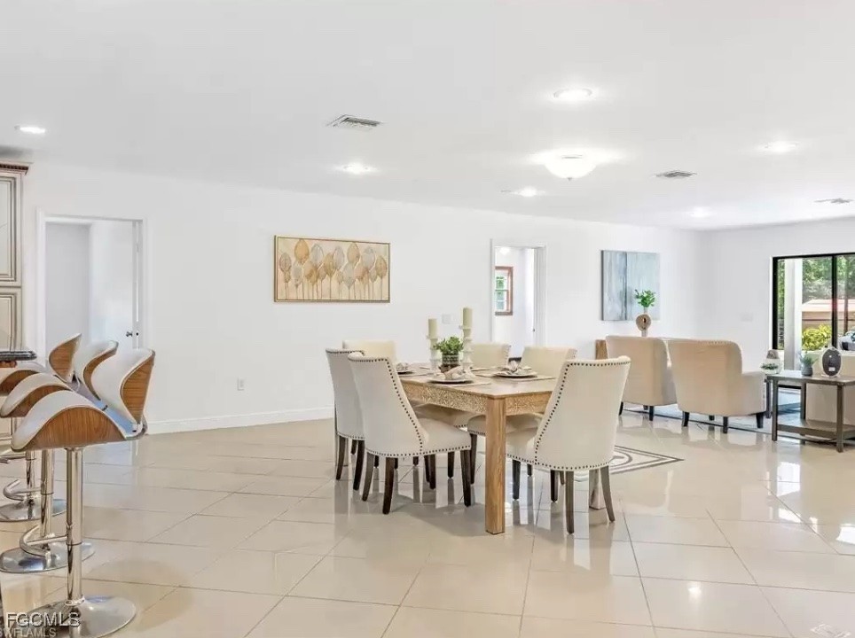 6343 Mark Lane Fort Myers, FL 33966 - Photo 11 of 37 a view of a dining room with furniture