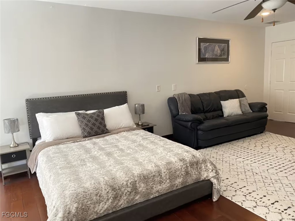 6343 Mark Lane Fort Myers, FL 33966 - Photo 19 of 37 a large white bed in a white room