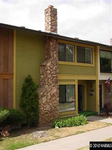 1451 Foster Drive Reno, NV 89509 - Photo 1 of 13 a front view of a house with garden
