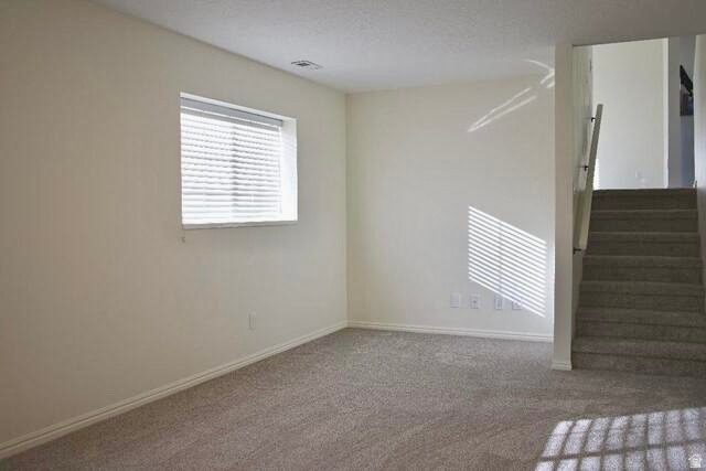 778 North 250 West Springville, UT 84663 - Photo 10 of 16 Unfurnished room featuring stairs and dark colored carpet