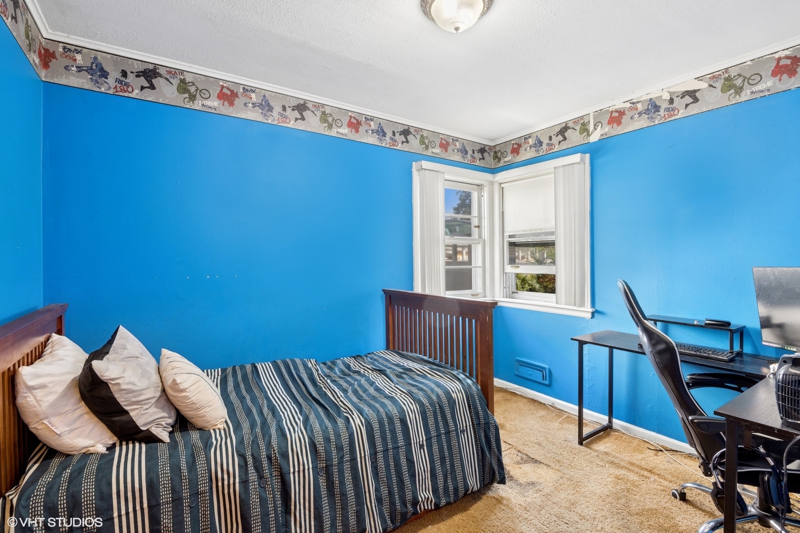 1315 Webster Lane Des Plaines, IL 60018 - Photo 7 of 18 a bedroom with a bed and a window