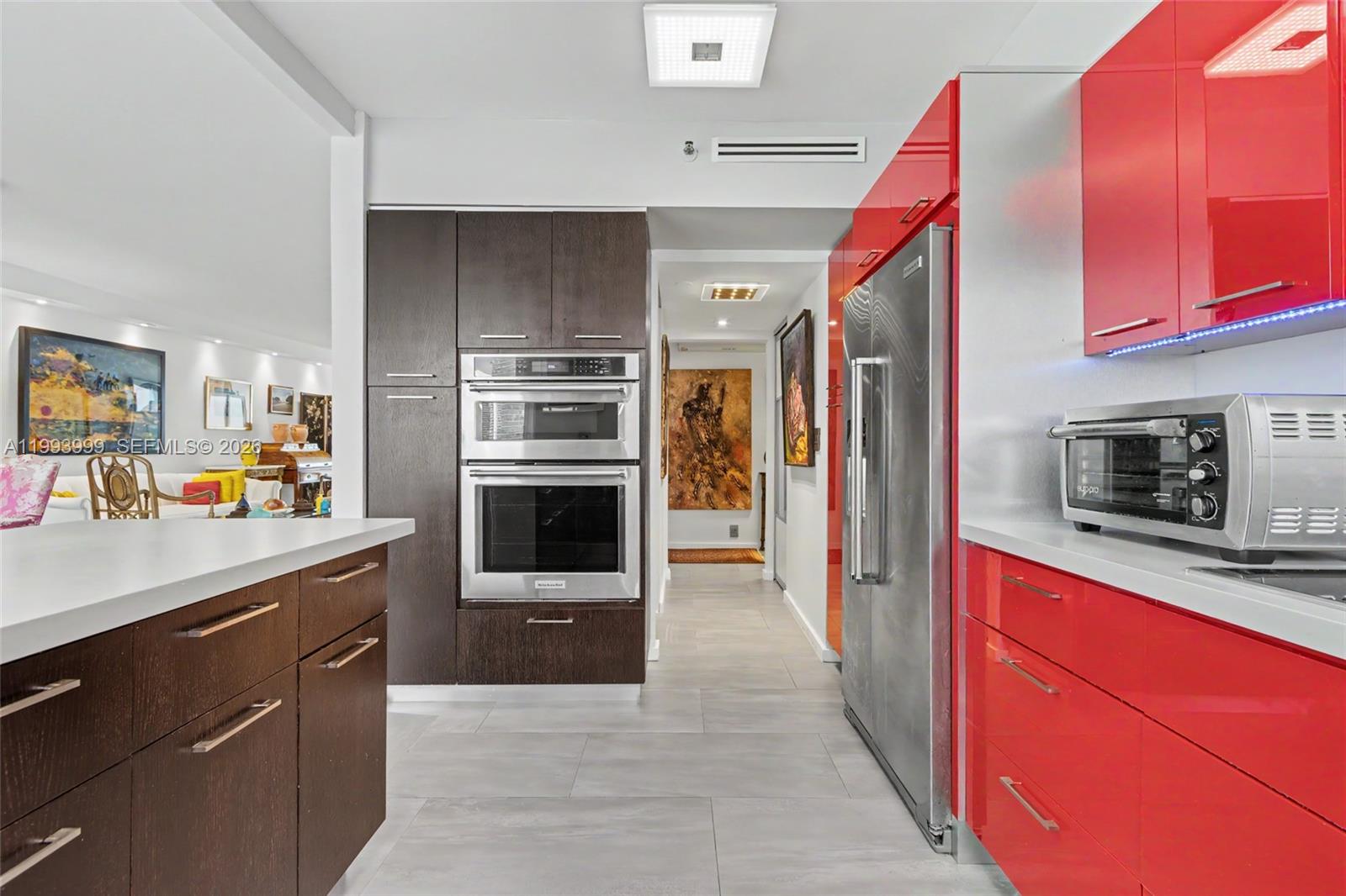 1541 Brickell Avenue, Unit B2904 Miami, FL 33129 - Photo 16 of 47 a kitchen with stainless steel appliances granite countertop a refrigerator and a stove top oven
