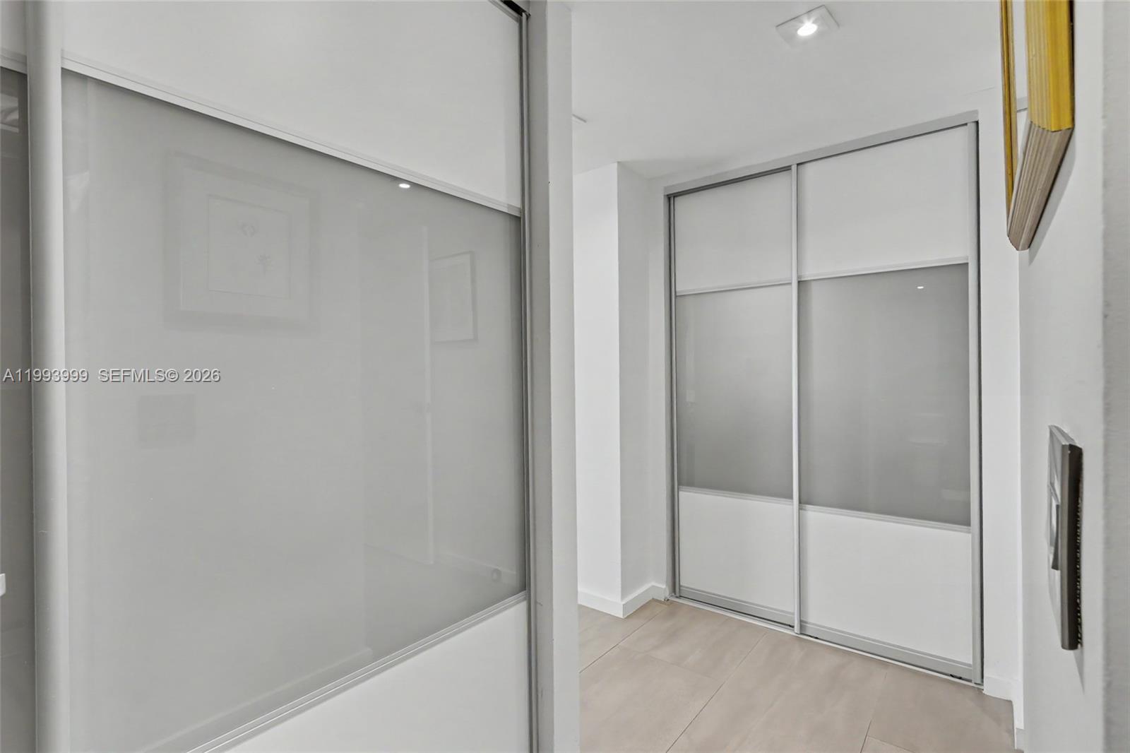 1541 Brickell Avenue, Unit B2904 Miami, FL 33129 - Photo 28 of 47 a bathroom with a glass shower door