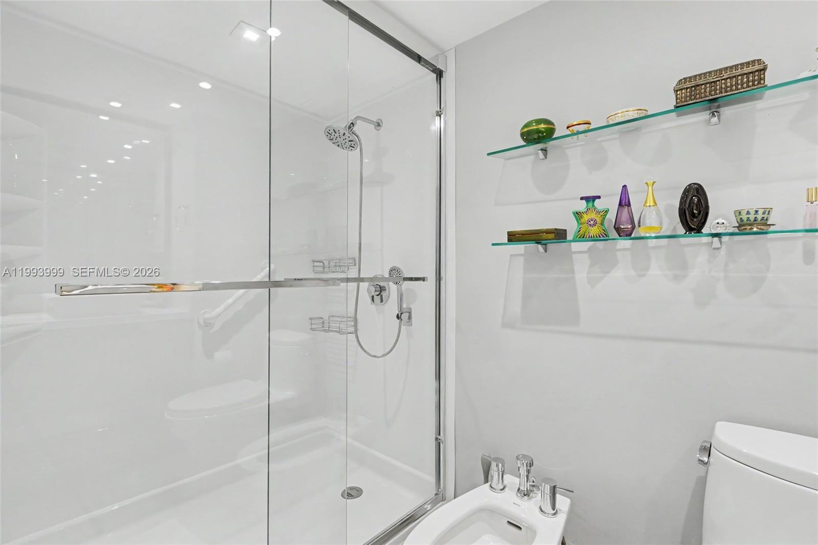 1541 Brickell Avenue, Unit B2904 Miami, FL 33129 - Photo 30 of 47 a bathroom with a shower and a toilet