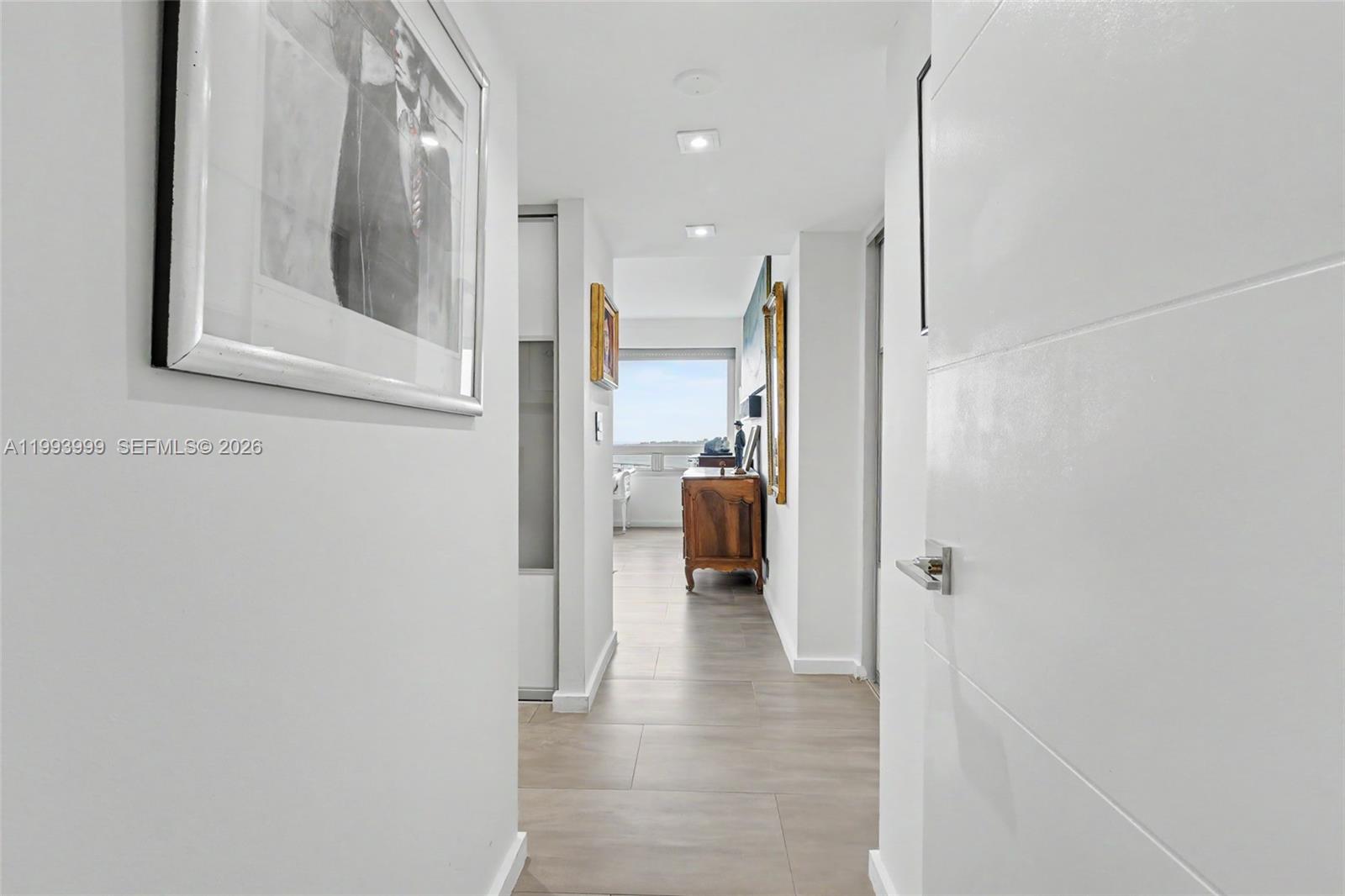 1541 Brickell Avenue, Unit B2904 Miami, FL 33129 - Photo 31 of 47 a view of a hallway with a view of living room