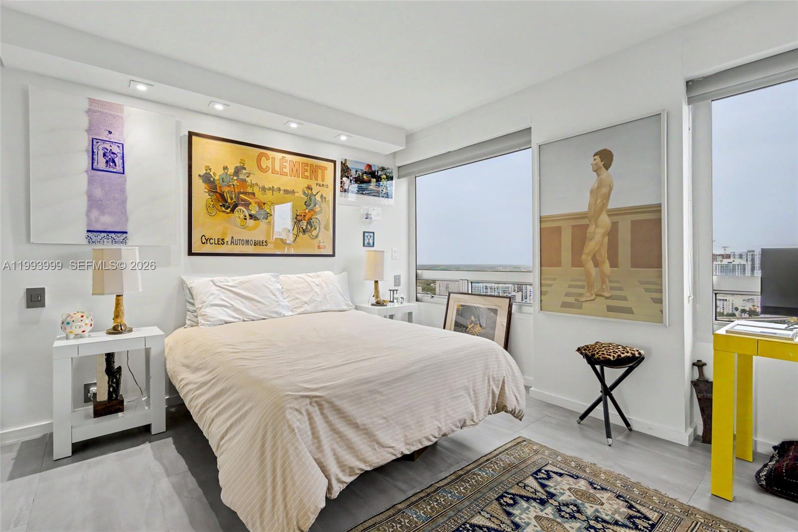 1541 Brickell Avenue, Unit B2904 Miami, FL 33129 - Photo 33 of 47 a bedroom with a bed and painting on the wall