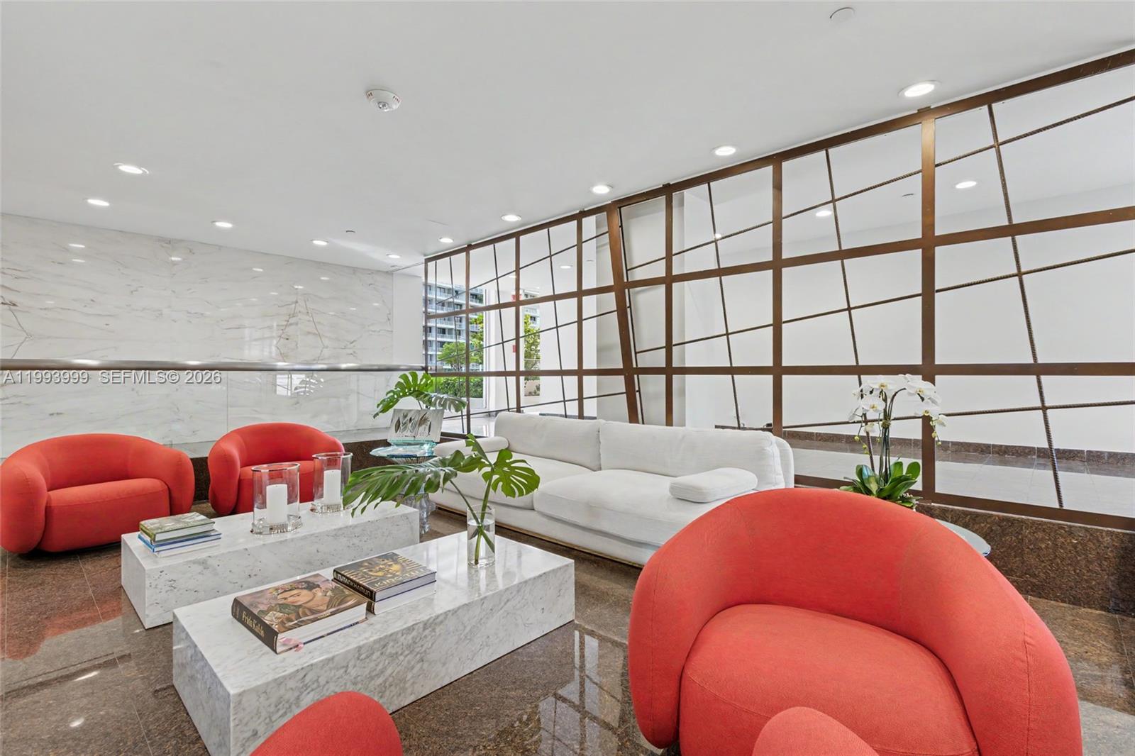 1541 Brickell Avenue, Unit B2904 Miami, FL 33129 - Photo 40 of 47 a living room with furniture and a window