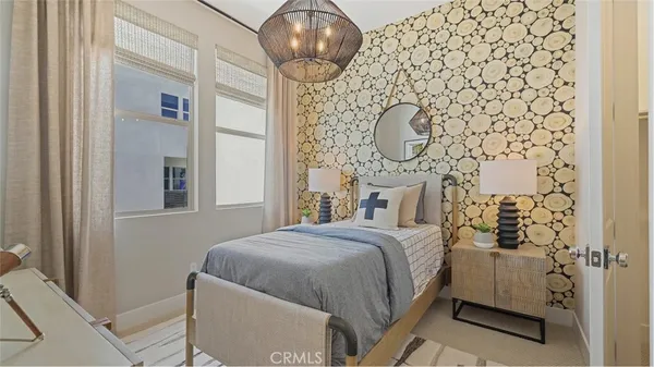 a en suite bathroom with a sink a mirror and a shower