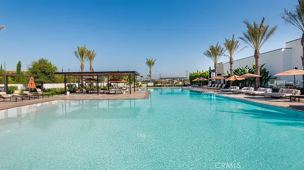 a view of a porch with furniture and garden