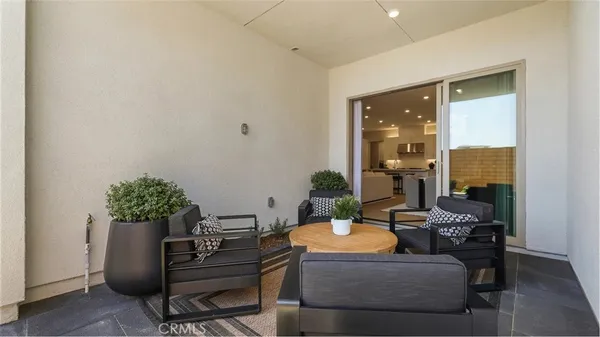 a backyard of a house with seating space